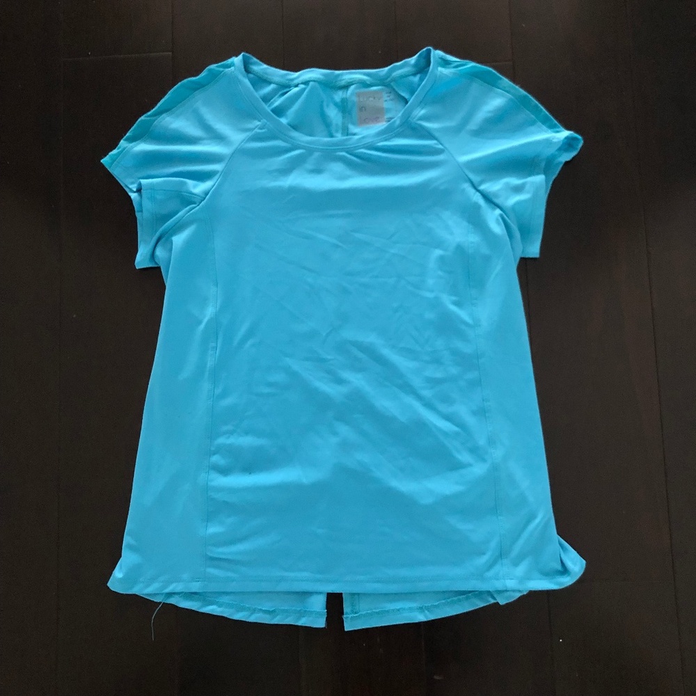 Lucky in Love short sleeve athletic shirt. Size M (8-10)
